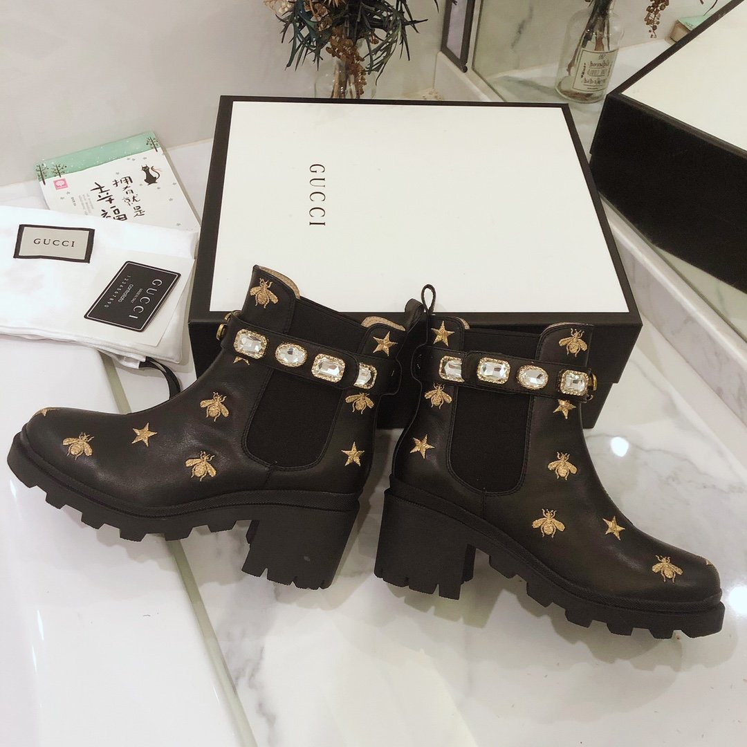 G*u*i boots