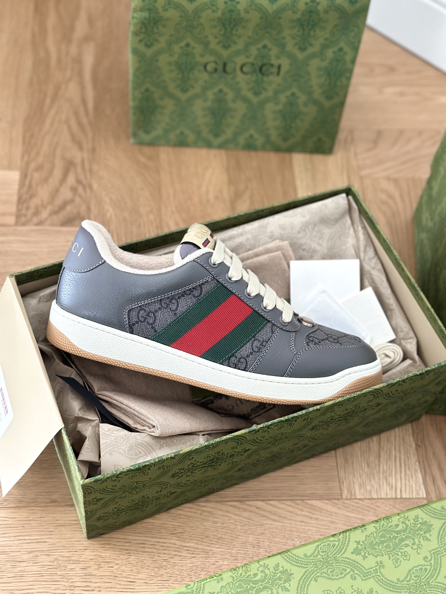 G*u*i sneakers